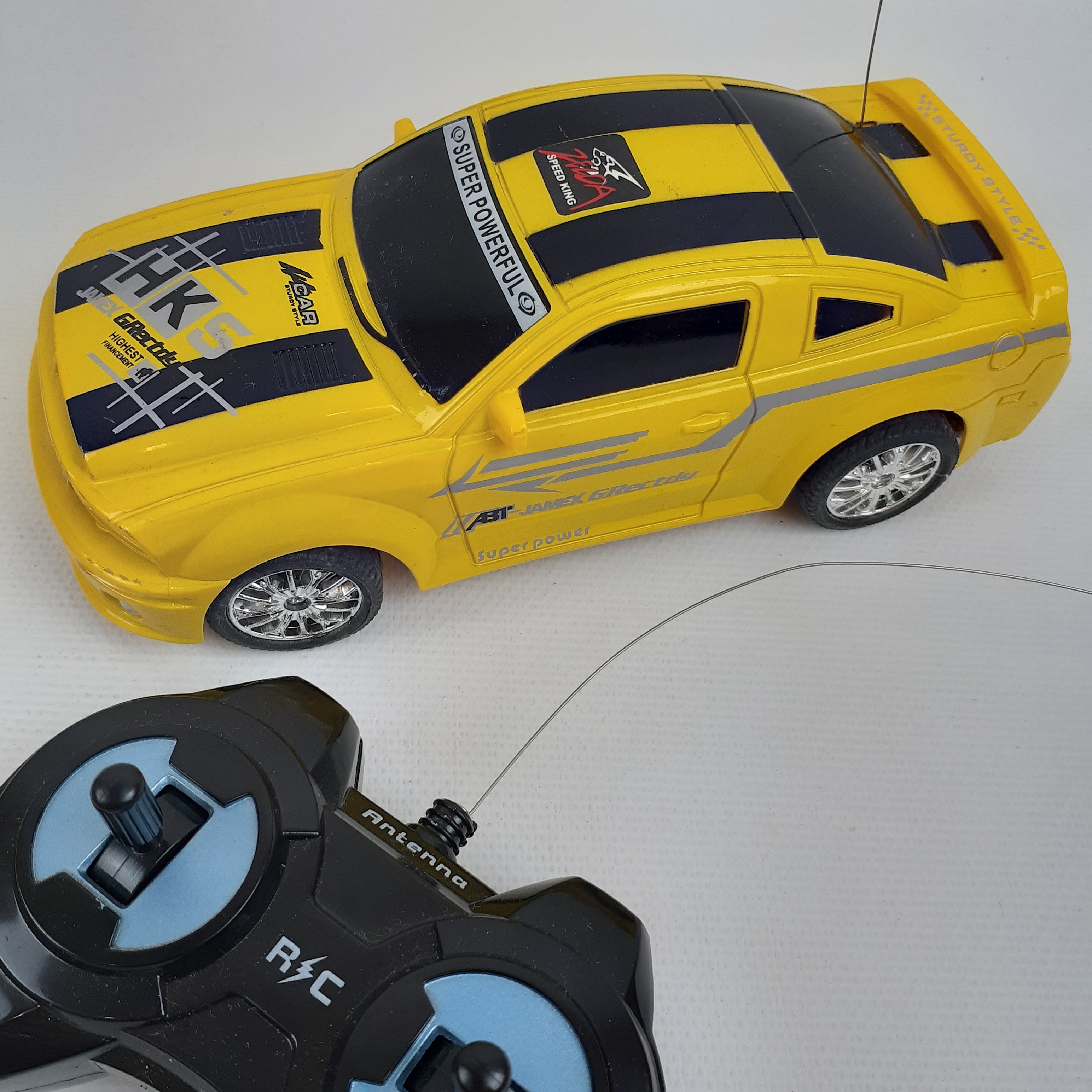 Voir photo 5 de Voiture radiocommandée Thunder Race échelle 1/20 Voiture radiocommandée Thunder Race échelle 1/20 Très bon état - Vue 5 -